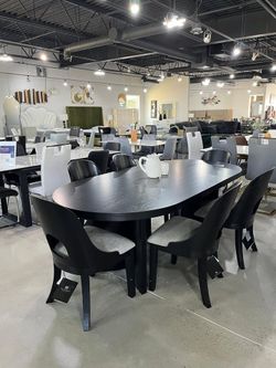 Stunning black finish oval dining set w/ultra sleek design chairs
