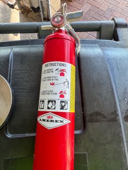 FIRE EXTINGUISHER STILL FULLY CHARGED NEVER USED