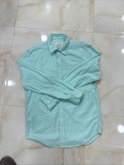 St. John's Bay light green long sleeve button-up shirt. Size M