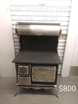 BRAND NEW CAST IRON WOOD STOVES