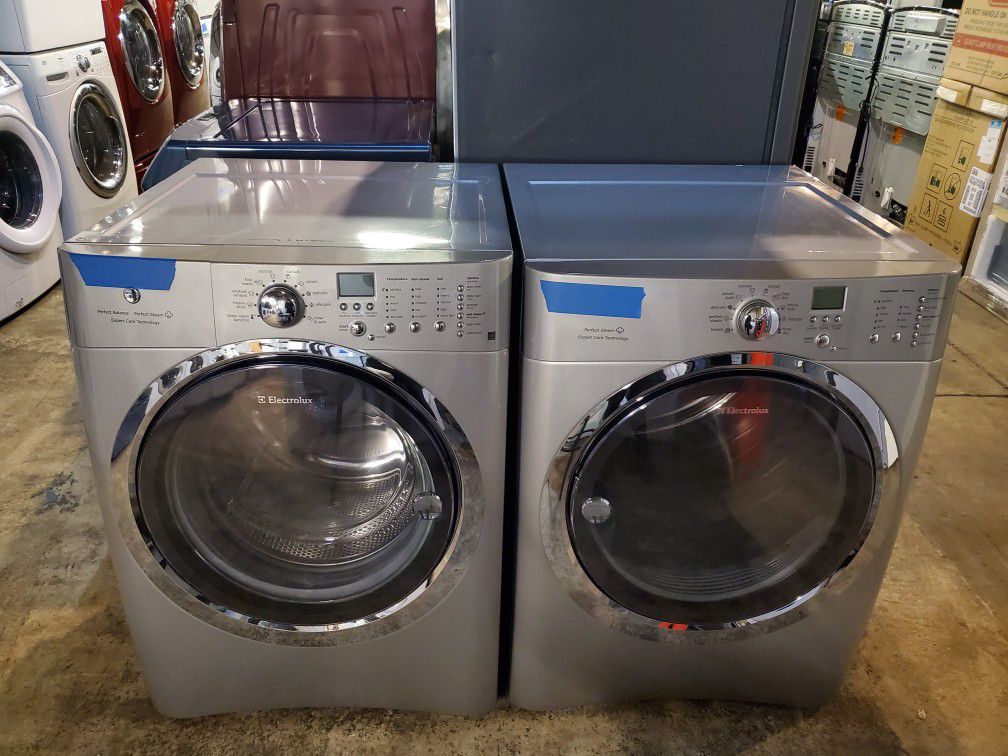 Electrolux front load Washer and dryer set in excellent conditions four months warranty
