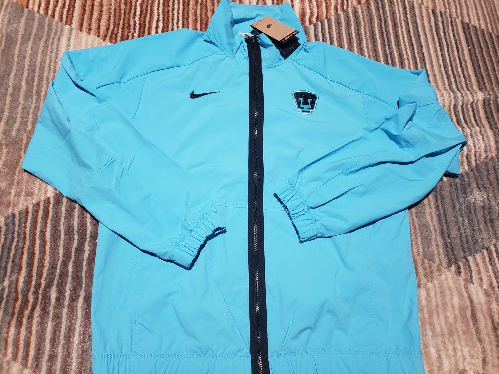 NIKE PUMAS UNAM REVIVAL WOVEN TRACK JACKET 2023/24