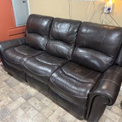 2 Electronic Leather Reclining Couches. 