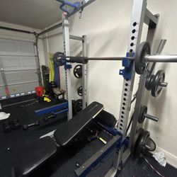 Squat Rack, Bars, Bench, and Plates