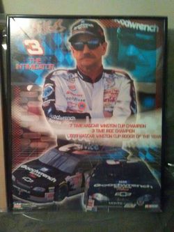 Dale Earnhardt posters on wooden wall hangers