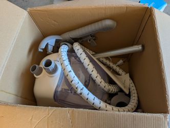 Standing steamer for clothes