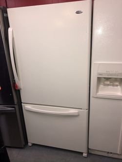 Used Amana bottom freezer fridge. 1 year warranty
