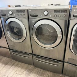 LG XL capacity washer and dryer set with pedestals