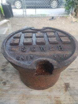 Salvaged found sewer cap