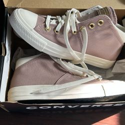Brand new woman’s Converse size 9