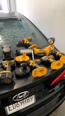 Dewalt tools, batteries, charger, bag and more.
