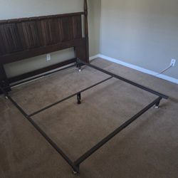 Queen Size Steel Bed Frame On Rollers. Excellent Condition