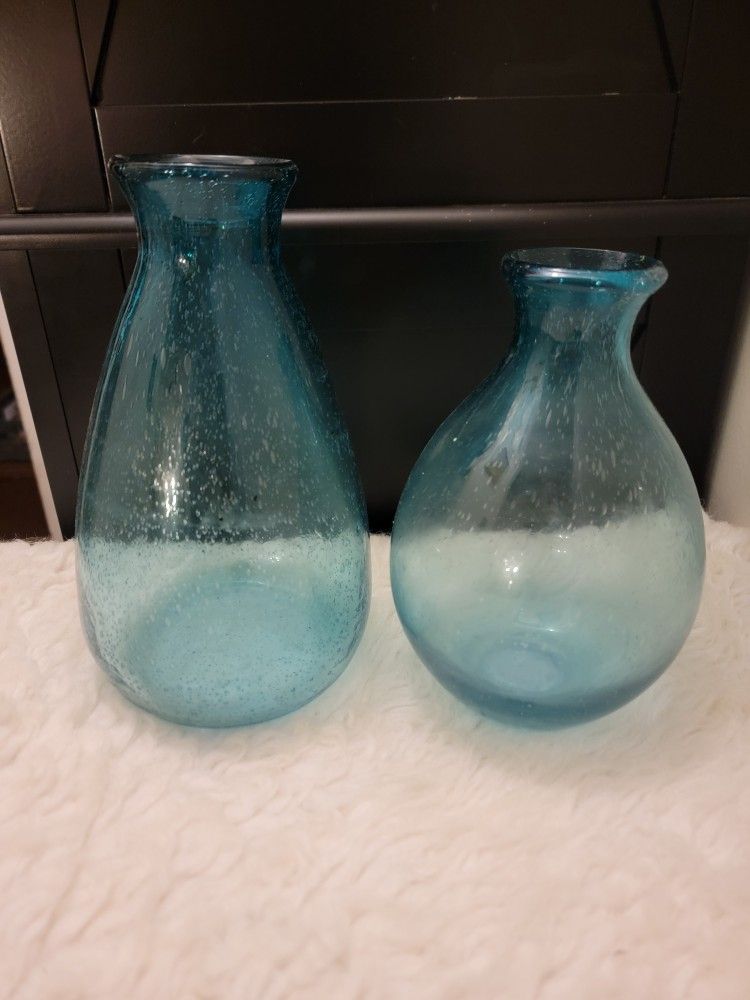 Two handblown crackle glass vases with a turquoise blue ombré color 9" and 8"