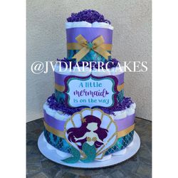 Mermaid themed diaper cake great for baby showers and centerpiece