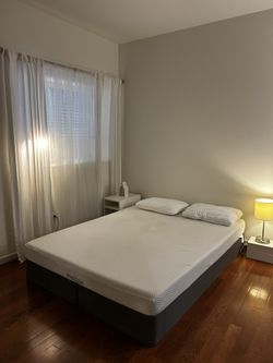 Queen Size Bed (mattress plus foundation) additional bedside tables and lamp