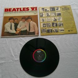 The Beatles Second Album Vinyl LP is a rare gem for any classic rock music collector. Featuring iconic hits from the legendary band, this 12" record i