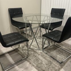 DINING ROOM TABLE + CHAIRS + RUG