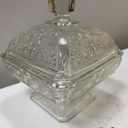 Vintage Clear Glass patterned Oak Leaf Acorns Candy Dish with lid.  Good condition.  Measures 5 1/2" by 5 1/2" and is 6 1/2" tall.