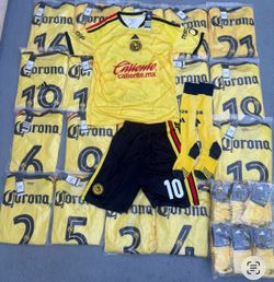20 sets Club America home and away and Barcelona Soccer uniforms ready to pick up or i can ship them any where in the US 40$ each set includes jerseys