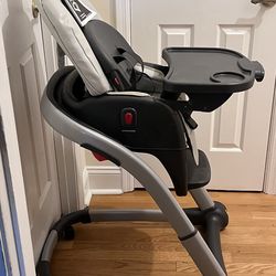 Feeding chair w/booster seat.