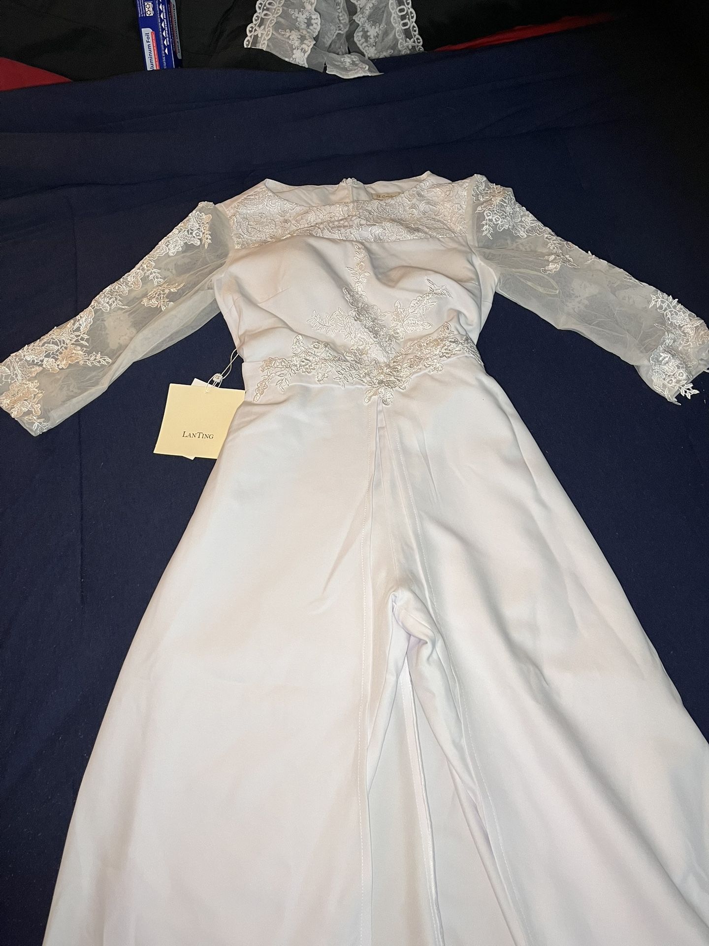 Lan Ting white wedding jumpsuit with wraparound skirt and lace detailing US 6