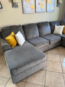 Beautiful Grey sectional couch with double chaise