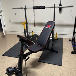 Equipo de gimnasio completo usado – banco + pesas