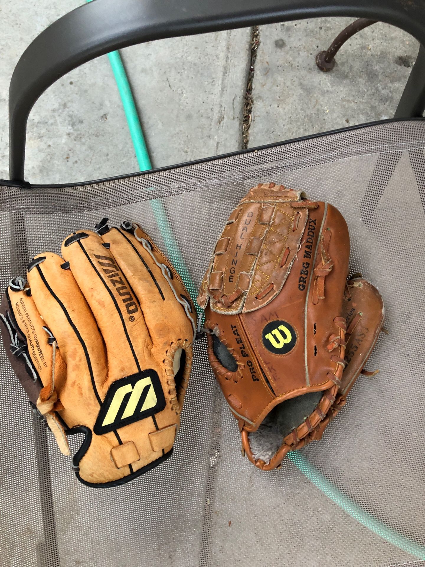 Kids baseball gloves (both included ) Wilson