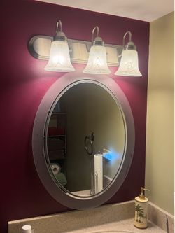 FREE: 28”x23” Oval Mirror
