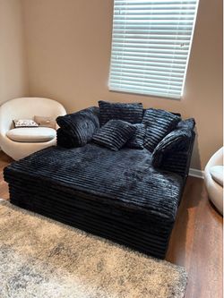 Brand new. Comfy black corduroy sleeper couch