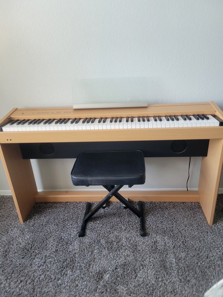 Roland F-100 Digital Piano. Like New.  Cash Only