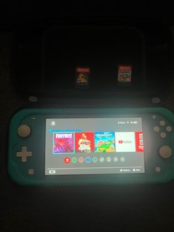 Nintendo Switch Lite Teal with Game Cartridges
