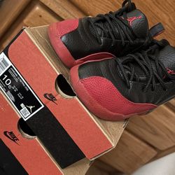 2 pairs of Jordan Retro (PS) {Size:1y } & Size:10 CRed/Black 