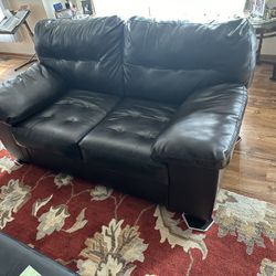  Dark Brown Leather Love Seat And Three Living room Tables