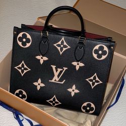 Louis Vuitton OnTheGo MM Bicolor Black/Cream Monogram Empreinte Leather Tote