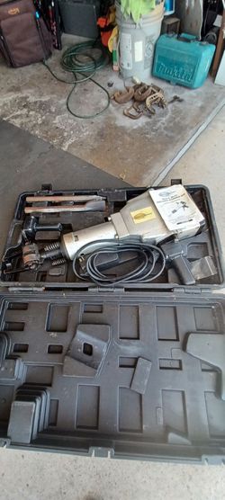 Heavy duty jackhammer and 50' drain snake.