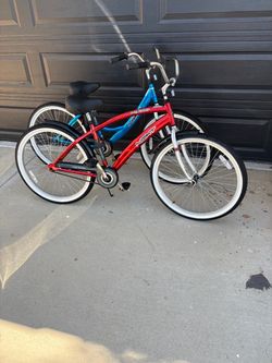 Two adult beach cruiser bikes