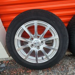 Michelin X-Ice Tires 215/60/R16 Installed On Alluminum Wheels