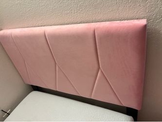 Two Pink twin bed frames