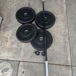 Rogue hi temp Olympic weights 160lbs total plus 6ft ROGUE C-70S BAR plus rogue clamps
