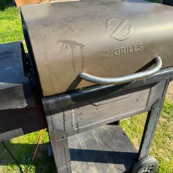 Grill and smoker Uses pellets