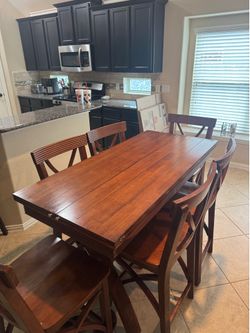 Solid wood expanding dining room table set