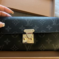 LV Wallet $150