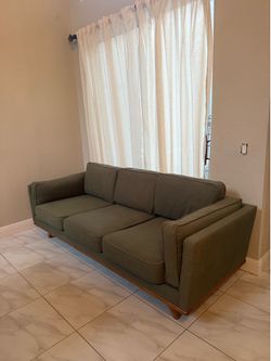 Mid century modern green sofa