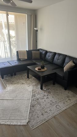Sofa tables and rug for sale. Includes pillows