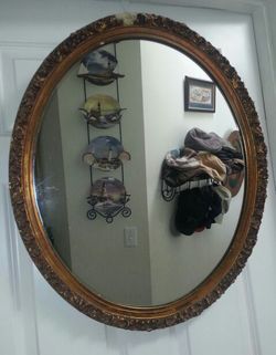 Vintage/antique gilded Bassett Co. oval mirror