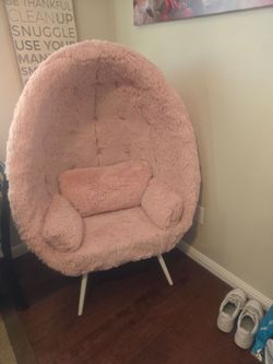 Pink fuzzy egg chair