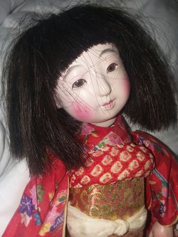 Antique Oriental doll