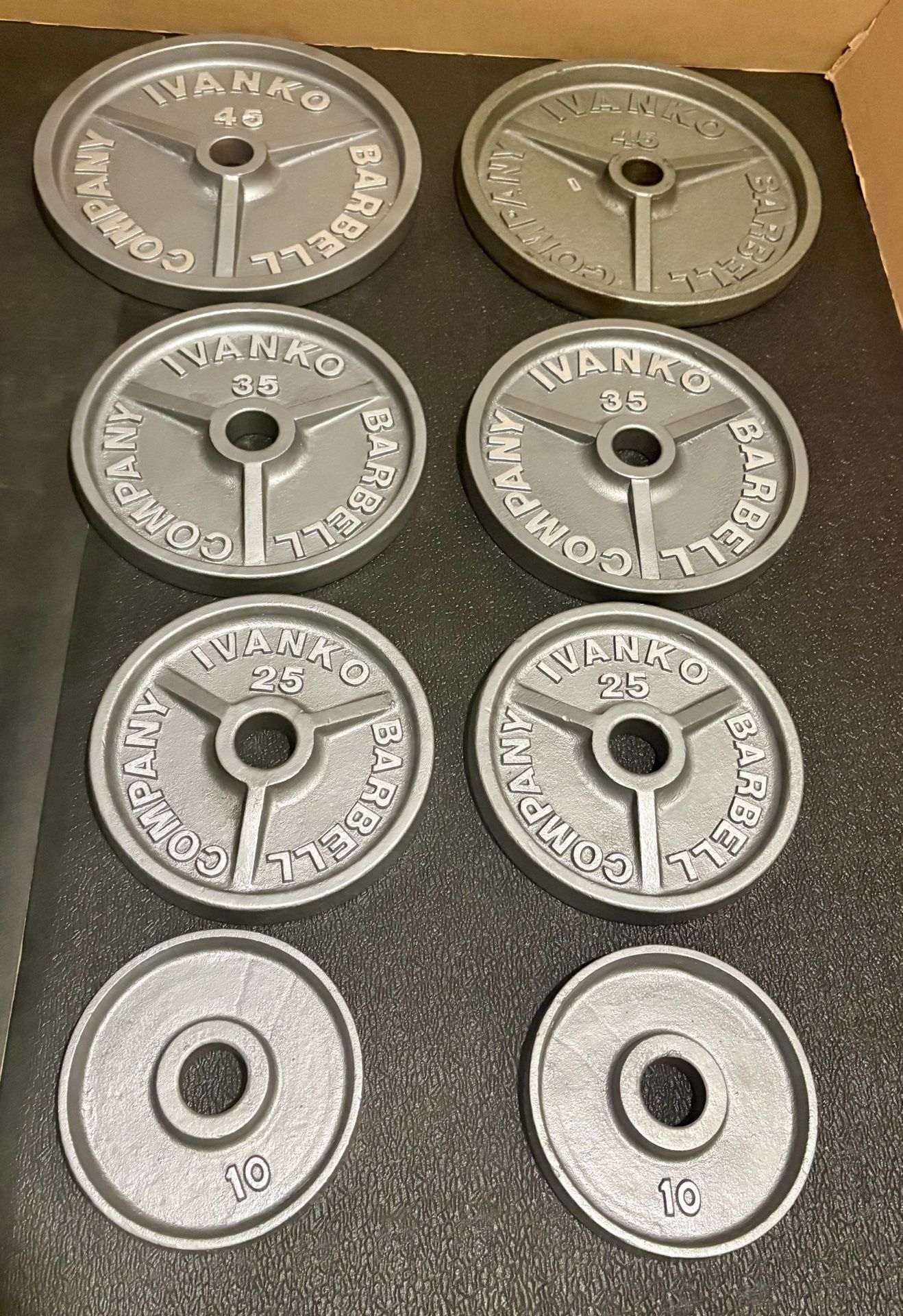 Set of Olympic Vintage IVANKO Weight Plates: Pairs of 45s, 35s, 25s and 10s. Reconditioned Total: 230 #