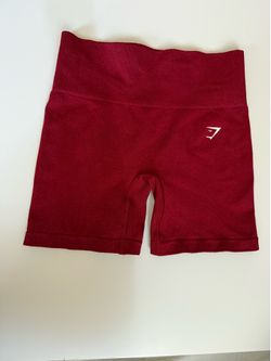 Size small red gymshark shorts